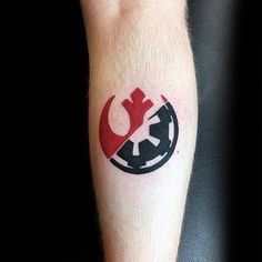 a star wars symbol tattoo on the arm