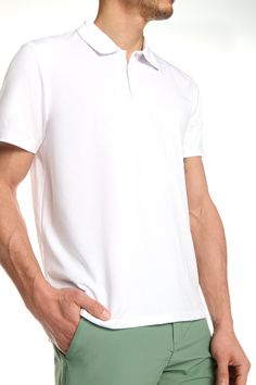 This polo tee is the perfect addition to any man's staple wardrobe. The self collar and three front buttons offer a classic look that is appropriate for any setting. Made with a blend of polyester, cotton and spandex, which offers durability, stretch and comfort. Closet staple Classic polo collar with buttons Comfortable fabric Available in 6 colors Staple Wardrobe, Polo Tees, Closet Staples, Polo Golf, Golf Polo, Polo Collar, Classic Looks, Wardrobe Staples, Mens Polo