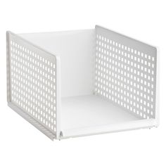 a white plastic basket with holes on the front and sides, in an open position