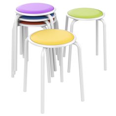 four stools with different colored seats on each one, all stacked up and facing the same direction