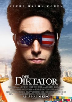 the dictator movie poster with a bearded man wearing red sunglasses and a flag on his face