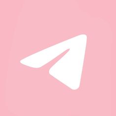 a white arrow on a pink background