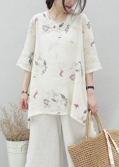 Modern beige print linen tunics for women v neck half sleeve baggy summer blouse

Materials used:linen blended

Measurement:One size fits all for this item. Please make sure your size doesn't exceed this size: XXL/BUST-110cm   
   
length front 73cm / 28.47"
length back 79cm / 30.81"
bust 110cm / 42.9"
Shoulder 42cm / 16.38"
Sleeve length 34cm / 13.26"
Armhole 32cm / 12.48"



We ship worldwide.

Tracking numbers provided for all orders. Summer Vacation Blouse With Half Sleeves, Cream Short Sleeve Blouse For Summer, Casual Beige Half Sleeve Blouse, Casual Half Sleeve Tunic For Spring, Beige Floral Print Short Sleeve Blouse, Printed Half Sleeve Summer Blouse, Summer Printed Half Sleeve Blouse, Beige Short Sleeve Blouse With Floral Print, Casual Short Sleeve Beige Tunic