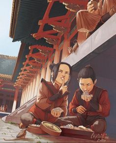 two people sitting on the ground eating food