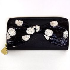 *New* - Never Been Used A Wallet/Clutch With A Black And White Polka Dot Sequin Bow. Has 12 Slits For Credit Cards And 1 Clear For A Drivers License/Id. 8in X 4in Elegant Black Wallet, Trendy Evening Wallets With Card Slots, Trendy Black Wallets For Party, Chic Black Bifold Coin Purse, Party Wallets With Zipper Closure, Rectangular Wallets With Zipper Closure For Party, Rectangular Party Wallets With Zipper Closure, Black Clutch With Zipper Closure For Party, Black Evening Coin Purse With Zipper Closure