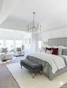 an image of a bedroom with white walls and furniture on the bottom right hand corner