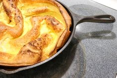 a cast iron skillet with some food in it