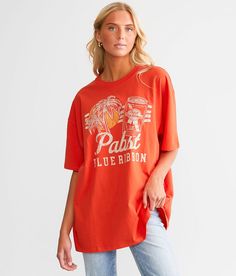 Goodie Two Sleeves Pabst Blue Ribbon® Beer T-Shirt - Red S/M, Women's Red Alert Distressed graphic t-shirt Bust measures 48 on size S/M Body length 29 on size S/M. 100% Cotton. Machine wash cold with like colors gentle cycle. Only non-chlorine bleach. Tumble dry low. Low iron if needed. Do not iron decoration.. Measurements: Bust -Fullest part of bust with arms at sides. Waist -Circumference of natural waist: above belly button below rib cage. Hips -Standing with feet together fullest part of hi Trendy Long Sleeve Red T-shirt, Red Long Sleeve Summer T-shirt, Retro Red Short Sleeve Camp Shirt, Red Graphic Print T-shirt For The Beach, Orange Long Sleeve Graphic T-shirt, Pabst Blue Ribbon Beer, Pabst Blue Ribbon, Tshirt Bag, Blue Ribbon