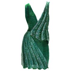 Roberto Cavalli Fully Beaded Drape Illusion Mini Dress Designer size - 40 100% Silk, Fully Hand Beaded in Green and Graphite Beads in Drape Illusion Look, Deep Plunging, Fully Lined. Measurements: Length - 33 inches, Bust - 30/32", Waist - 26", Hips - 36". Made in Italy. Excellent condition. Roberto Dress, Plunging Dress, Roberto Cavalli Dress, Tree Dress, Fancy Gowns, Rose Gold Sunglasses, Plunge Dress, Dress Designer, Green Sequins