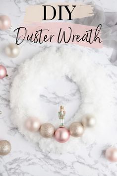 the diy duster wreath with pink and gold ornaments