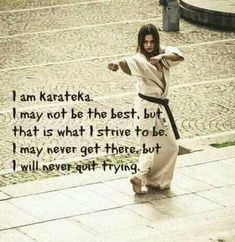 a man in karate attire pointing at the ground with an inspirational quote above him that reads, i am kaarteka, i may not be the best, but that is what i