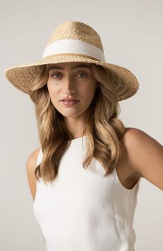 A curved brim enhances the breezy sophistication of this woven raffia hat finished with a wide grosgrain band. Interior size-adjuster band Raffia straw Spot clean Imported Chic Straw Panama Hat With Curved Brim, Elegant Straw Visor Hat, Chic Straw Fedora With Curved Brim, Chic Straw Fedora With Upf 50+, Chic Wide Brim Straw Fedora, Chic Straw Fedora For Kentucky Derby, Chic Visor Sun Hat For Kentucky Derby, Elegant Visor Straw Hat For Vacation, Elegant Vacation Straw Visor Hat