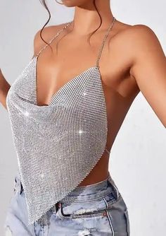 Shine bright and make a statement with the Millie Sparkly Rhinestone Chainmail Scarf Hem Tank Top, a show-stopping piece that blends bold design with glamorous flair. Perfect for nights out or special occasions, this women's fashion sleeveless tank top is designed to turn heads and capture the light with every movement. Rhinestone Chainmail: The shimmering rhinestone chainmail fabric creates a dazzling effect, reflecting light beautifully and adding a touch of luxury and glamour to your outfit. Scarf Hem Design: The unique scarf hem adds a dynamic and flowing element to the women's fashion sleeveless tank top, creating a captivating silhouette that moves elegantly with you. Tank Top Style: The sleeveless design highlights your arms and shoulders, offering a sleek and modern look that pairs Trendy Metallic Party Jewelry, Trendy Metallic Jewelry For Party, Glamorous Summer Jewelry For Night Out, Disco Style Silver Jewelry For Party, Glamorous Rhinestone Jewelry For Night Out, Summer Party Jewelry With Bling, Summer Party Jewelry With Rhinestones, Glamorous Embellished Party Jewelry, Chainmail Fabric