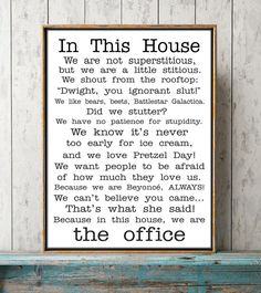 a framed poster with the words in this house