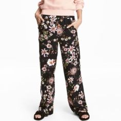 Wide, High-Waisted Trousers In A Soft, Patterned Viscose Weave. Wide Elastication At The Waist And Side Pockets. Black/Floral Composition: Viscose 100% Care Instructions: Machine Wash At 30, Follow Care Label Concept: Everyday Fashion Us 6, Eur 36, Ca 6, Cn 165/68a, Mx 6 (H&M Sizing) Inseam: 28 5/8", Top Of Wb Flat: 13 1/2" (27 Total) Never Worn, Tag Still Attached. It's Just Been Sitting Folded In A Box In My Closet Lol Black Summer Pants For Daywear, Fitted Casual Viscose Pants, Casual Fitted Viscose Bottoms, Fitted Casual Viscose Bottoms, Fitted Viscose Casual Bottoms, Fitted Viscose Bottoms, Fitted Viscose Bottoms For Spring, Black Viscose Pants For Summer, Black Pants For Spring Daywear