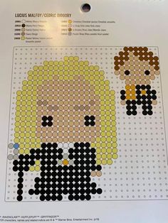 a cross stitch pattern with two people on it