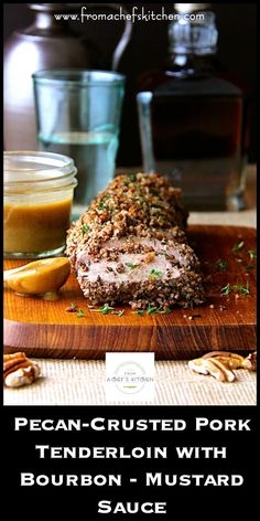 pecan crusted pork tenderloin with bourbon - mustard sauce on a cutting board