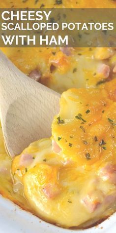 cheesy scalloped potatoes with ham in a white casserole dish