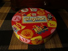 a toy box sitting on top of a checkered floor