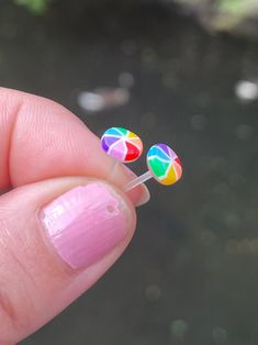 Non-Metal Earrings, Beach Balls, Plastic Post Studs For Sensitive Ears, Nickel Free Hypoallergenic Stud Earrings, Great for kids or women These earrings are handmade on a plastic post for your sensitive ears. They are very lightweight and comfortable to wear. These beautiful colorful beach ball stud earrings are made of resin. They have a flat back and they measure 5mm round. They look great on kids and adults. Best of all you don't have to worry about metal allergies because they do not contain Summer Hypoallergenic Multicolor Jewelry, Hypoallergenic Rainbow Round Earrings, Adjustable Rainbow Earrings As Gift, Plastic Earrings For Gifts, Round Plastic Earrings For Gifts, Fun Rainbow Hypoallergenic Jewelry, Fun Multicolor Hypoallergenic Jewelry, Colorful Round Earrings For Beach, Cute Rainbow Hypoallergenic Earrings