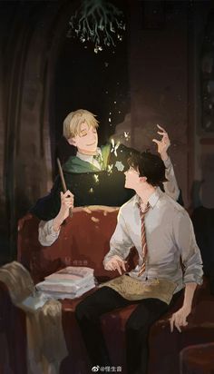 two people sitting on a couch with sparklers in the air and one person holding a wand