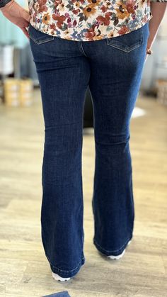 Women's Dark High Rise Flare Jeans Judy Blue Ocean Breeze Make a splash with Judy Blue Ocean Breeze jeans. These dark washed, high rise jeans feature a stylish side seam detail and flared bottom. Non-distressed for a classy, appropriate look that's perfect for work or formal casual events. Dive into style with Judy Blue! Shop more from our Bottoms collection HERE. Details Available in sizes: 0(24) - 15(32) Available in color: Dark Wash High rise Side seam detail Flared bottom Non-distressed Fabr