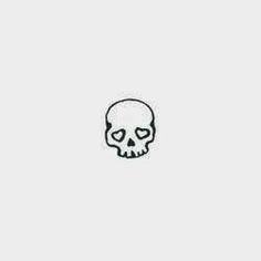 a black and white drawing of a skull