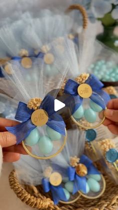 two baskets filled with blue and gold candies