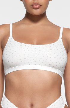 Buttery-soft, stretch-enhanced nylon molds to your figure for a second-skin fit that stays smooth in this supportive scoop-neck bralette. Pack of two assorted bralettes Lined 79% nylon, 21% spandex Hand wash, dry flat Imported Scoop Neck Camisole With Removable Bra Pads, Everyday Scoop Neck Bra With Adjustable Straps, Seamless Medium Support Scoop Neck Bra, Seamless Scoop Neck Bra With Medium Support, Everyday Seamless Scoop Neck Bra, Everyday Camisole Sports Bra, Supportive Seamless Scoop Neck Bra, Stretch Cropped Bra With Adjustable Straps, Seamless Shaping Sports Bra