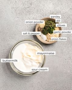 ingredients to make homemade mayonnaise in small bowls on the counter top, labeled with labels