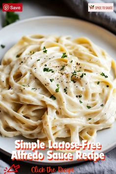 a white plate topped with pasta covered in sauce