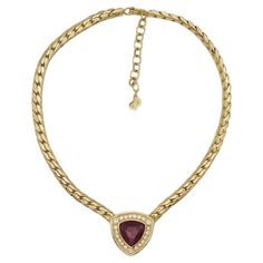 Christian Dior Vintage 1980s Ruby Red Diamond Triangle Crystals Necklace, Gold Plated Very good condition. Not any colour loss except the clasp. 100% Genuine. Marked 'Chr.Dior (C) '. Rare to find. Length: 36 cm. Extend chain: 6 cm. Pendant: 2.8*2.8 cm. Weight: 48 g. _ _ _ Great for everyday wear. Come with velvet pouch and beautiful package. Makes the perfect gift for Teens, Sisters, Friends, Girlfriends, Birthdays, Anniversaries, Mother’s Day, Valentine’s Day, Christmas and many more. With exquisite fine detail, these fashion jewellery are ideal for a glamorous look. Ideal for a splendid gift or an eye-catching jewellery for your everyday outfit. Also don't forget to look through my other listings, I have so many more beautiful jewellery waiting for you. _ _ _ I am a freelancer more than Crystals Necklace, Vintage Pendant Necklace, Dior Vintage, Red Diamond, Jewelry Lookbook, Velvet Pouch, Everyday Outfit, Fashion Jewellery, Vintage Jewellery