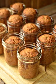 several jars filled with different kinds of food