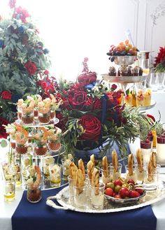 an assortment of desserts and pastries on a table