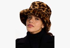 Made from fluffy faux fur this leopard-spotted bucket hat makes a fabulous addition to your cold weather wardrobe. | Kate Spade Leopard Faux Fur Bucket Hat, Natural Trendy Winter Bucket Hat With Flat Brim, Faux Fur Hat For Fall, Fall Hats With Faux Fur Lining, Fall Faux Fur Hat With Lining, Trendy Fall Bucket Hat, Faux Fur Lined Brimmed Bucket Hat, Trendy Fall Hats With Faux Fur Lining, Fur Bucket, Faux Fur Bucket Hat