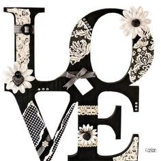 the word love is decorated with black and white lace, flowers, and polka dots