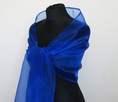 A very elegant organza shawl for your wedding party or evening dress. Made of luxury organza, slightly sparkles on the sun or light. Color: royal blue ( other colors are available ) Size : 200 cm x 45 cm You can use it as a wrap, shawl or stola. WE have matching bags in our Etsy Shop! WE accept Elegant Blue Shawl For Spring, Elegant Blue Shawl For Summer, Elegant Summer Blue Shawl, Elegant Blue Summer Shawl, Elegant Blue Shawl For Evening, Elegant Blue Shawl For Parties, Organza Shawl, Blue Dress Accessories, Capitol Couture