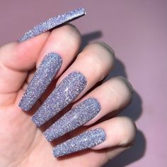 A true purple shade mixed with tiny crushed diamonds and holo shimmers is as iconic as you are! Maybe you can’t say ‘pastel periwinkle purple’ fast ten times but we have a feeling you’ll be flaunting Bubble Gem all year round! "The Kiara Sky Diamond FX Gel Collection was born to shine! 12 NEW reflective glitter gels with a diamond effect unlike any other. Featuring our signature long-lasting Colorbase formula, mixed with an infinite amount of ultra-sparkly KS Diamond Dust that transforms into a Purple Glitter Press On Nails, Pastel Periwinkle, Purple Gel Nails, Kiara Sky Gel Polish, Born To Shine, Kiara Sky, Crushed Diamonds, Cat Eye Gel Polish, Zoya Nail