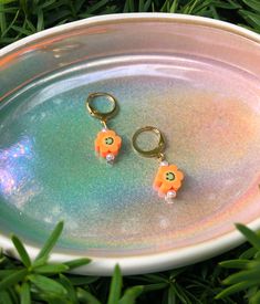 Trendy Orange Flower Earrings As Gift, Trendy Hypoallergenic Orange Jewelry, Trendy Orange Hypoallergenic Jewelry, High Potential, Earrings Hoop, 90s Nostalgia, Huggie Earrings, Pearl Charms, Everyday Earrings