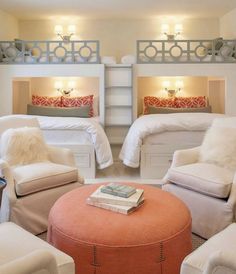 a bedroom with bunk beds and chairs in the corner, two are sitting on top of each other