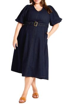 Elevate your office-casual look in this denim midi designed with a belted waist and airy flutter sleeves. 47" length Hidden back-zip closure V-neck Short sleeves Removable belt Unlined 100% cotton Machine wash, line dry Imported Chic Belted Knee-length Denim Dress, Chic Knee-length Belted Denim Dress, Belted Denim Dress For Summer Workwear, Chic Belted Denim Dress For Work, Spring Short Sleeve Belted Denim Dress, Belted Knee-length Denim Dress, Knee-length Belted Denim Dress For Work, Short Sleeve Belted Denim Workwear Dress, Belted Midi Denim Dress For Work