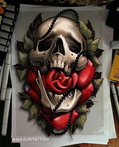 a drawing of a skull with a rose on it's face and beads around its neck