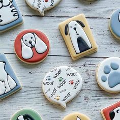 decorated cookies with dogs and words on them