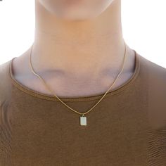 A Mini rectangle 18K Gold Bar pendant combined with a thin snake chain makes for simple minimalist necklace, perfect for daily wear. Also available in 18K Gold. DETAILS Pendant Size: 10mm x 7mm Chain style: 1.5mm snake - if you would like the curb chain option please let me know :) Materials: Stainless Steel / 18K Gold PVD Plating Necklace clasp: Lobster Hypoallergenic SIZE DETAILS The model is wearing a 20" and is the length we would recommend. Available in lengths: 20" / 22" / 24" QUALITY ASSU Mens Gold Necklace, Lingot D'or, Gold Bar Pendant, Men Jewellery, Gold Necklace For Men, Chain With Pendant, Etsy Jewellery, Gold Snake Chain, Necklace Clasps