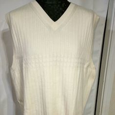 Tommy Hilfiger Men's Sweater Vest. Ivory Color. Size L. V-Neck, Sleeveless. Great For Layering. Nwot Classic White Vest For Fall, White Fitted Classic Sweater Vest, Classic White Sleeveless Sweater Vest, Classic White Sweater Vest For Winter, Classic Beige V-neck Vest, Fitted Cream V-neck Sweater Vest, Classic White V-neck Sweater Vest, Men's Sweater Vest, Sweater Vest Mens