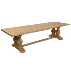 an old wooden table with two legs and a bench on one end, against a white background