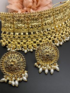 Eva SET | MerakeJewelry Elegant Meenakari Metal Jewelry Sets, Elegant Kundan Necklace In Antique Gold, Elegant Antique Gold Kundan Necklace, Ceremonial Gold Pearl Bridal Necklace, Traditional Antique Gold Bridal Necklace For Wedding, Gold Sets With Intricate Design For Reception, Elegant Heavy Bridal Accessories For Festive Season, Antique Gold Chandbali Jewelry For Wedding, Elegant Antique Gold Kundan Necklace With Intricate Design