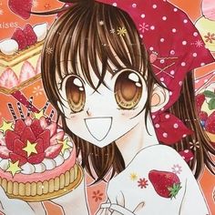 a girl holding a cake with strawberries on it