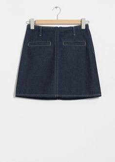 Denim mini skirt detailed duo welt pockets at the front, belt loops and topstitched detailing. Fastened with a zipper at the back.Length of skirt:43cm / 16.9" (EU 36 / UK 8 / US 4) Short Cotton Denim Skirt For Work, Workwear Short Cotton Denim Skirt, Dark Wash Denim Mini Skirt With Belt Loops, Dark Wash Mini Skirt With Belt Loops, Fitted Denim Skort With Belt Loops, Fitted Denim Skirt With Belt Loops For Work, Chic Denim Blue Mini Skirt With Pockets, Spring Mini Denim Skirt With Patch Pockets, Cotton Mini Denim Skirt For Work