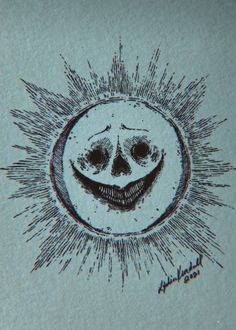 a drawing of a smiling face in the center of a sunburst